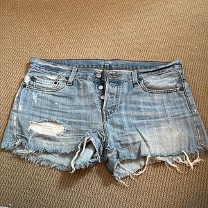 Levi’s, cutoff denim shorts in light blue, size 27